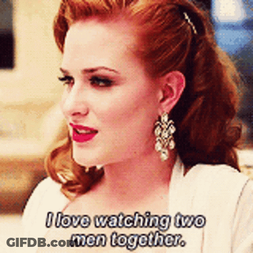 A Woman With Red Hair Says I Love Watching Two Men Together . GIF