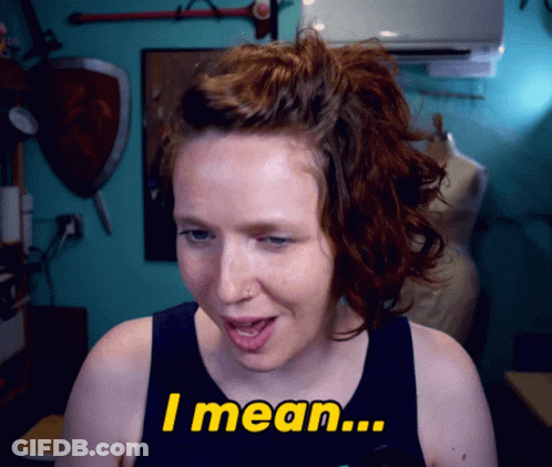 A Woman With Red Hair Says I Mean GIF