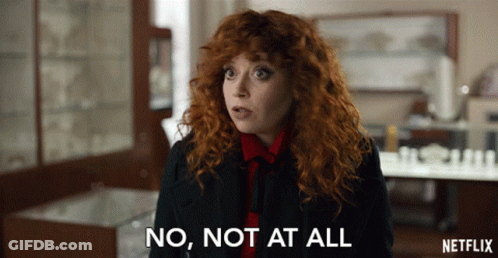 A Woman With Red Hair Says No Not At All In A Netflix Ad GIF