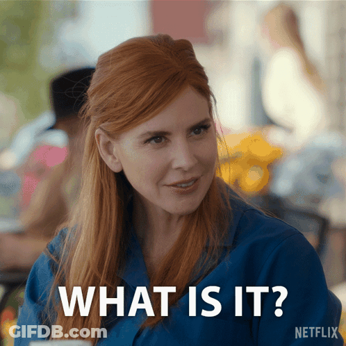 A Woman With Red Hair Says What Is It In A Netflix Ad GIF