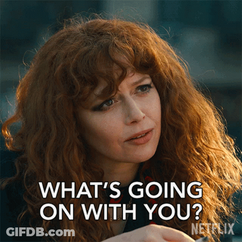 A Woman With Red Hair Says " What 'S Going On With You ? " GIF
