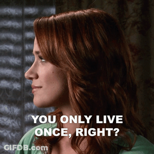 A Woman With Red Hair Says " You Only Live Once Right ? " GIF