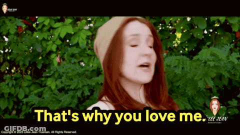 A Woman With Red Hair Singing That 'S Why You Love Me By Lee Jean Productions GIF