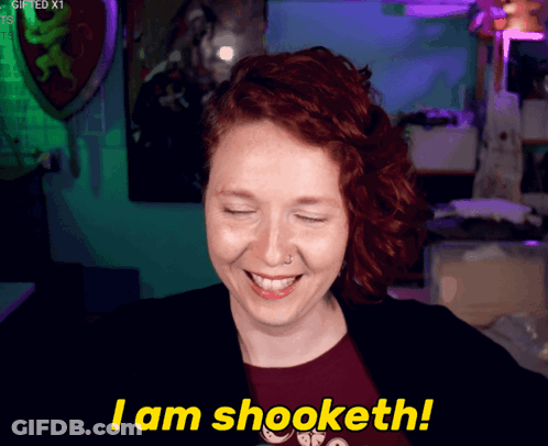 A Woman With Red Hair Smiles And Says I Am Shooketh GIF