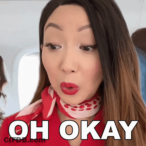 A Woman With Red Lips Is Wearing A Red Scarf Around Her Neck And The Words Oh Okay Above Her GIF