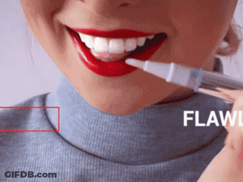 A Woman With Red Lipstick And White Teeth Is Holding A Whitening Pen GIF