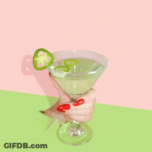A Woman With Red Nails Holds A Martini With Jalapenos On Top GIF