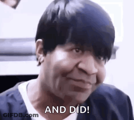 A Woman With Short Black Hair Is Making A Funny Face And Saying `` And Did '' . GIF