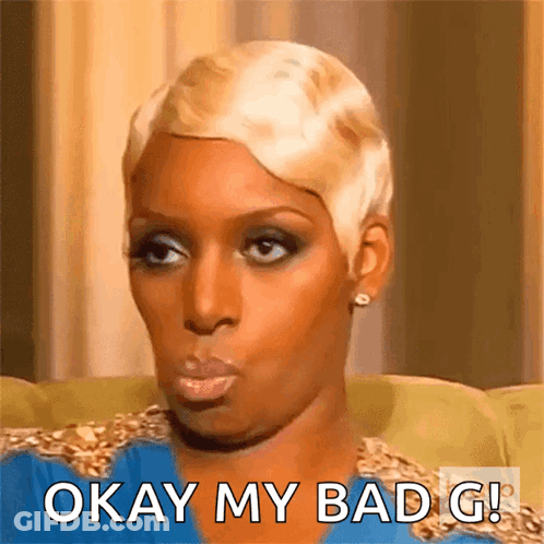 A Woman With Short Blonde Hair Is Sitting On A Couch And Says Okay My Bad G ! GIF