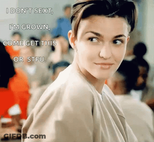 A Woman With Short Hair Is Looking At The Camera With A Caption That Says I Don 'T Sext I 'M Grown GIF