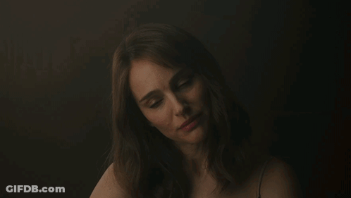 A Woman With The Name Gracie On The Bottom Of Her Face GIF