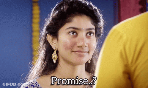 A Woman With The Word Promise Written On It GIF
