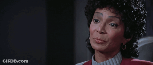 A Woman With The Words Be Careful What You Wish For Written Above Her GIF