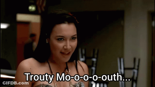 A Woman With The Words Trouty Mo-O-O-O-Outh Written On Her Face GIF