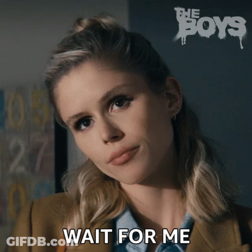 A Woman With The Words Wait For Me Written On Her Face GIF