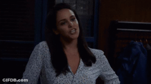 A Woman With The Words You 'Re Just Plain Boring On The Bottom GIF