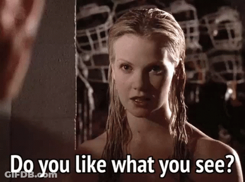 Wet-Haired Woman Looking In Mirror Do You Like What You See GIF