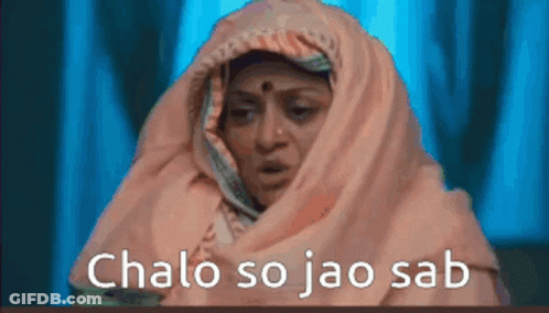 A Woman Wrapped In A Pink Scarf With The Words Chalo So Jao Sab Written On The Bottom . GIF