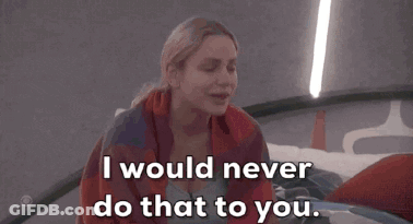 A Woman Wrapped In A Plaid Blanket Says " I Would Never Do That To You " GIF