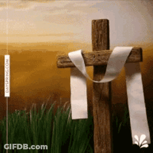 A Wooden Cross With A White Ribbon Around It And A Sign That Says Dayspring.com GIF