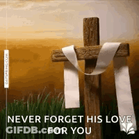 A Wooden Cross With A White Ribbon Around It And The Words `` Never Forget His Love For You '' GIF