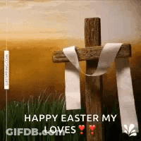 A Wooden Cross With A White Ribbon Wrapped Around It And The Words `` Happy Easter My Loves '' . GIF
