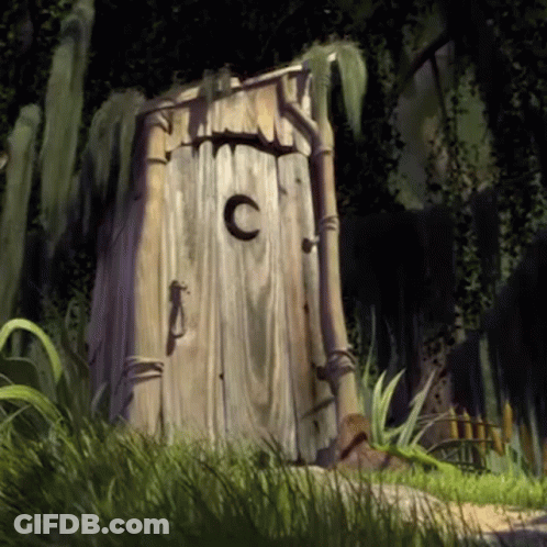 A Wooden Outhouse With A Letter C On It GIF