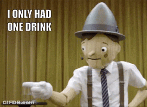 A Wooden Puppet Is Pointing At A Glass With The Words I Only Had One Drink Below Him GIF
