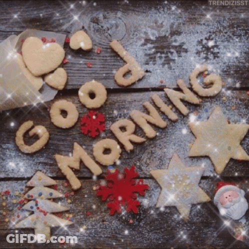 A Wooden Table Topped With Christmas Cookies And The Words Good Morning GIF