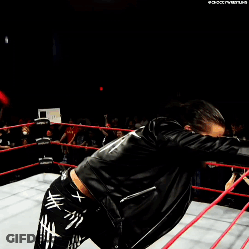 A Wrestler In A Ring With The Word Choccy Wrestling On The Bottom Right GIF
