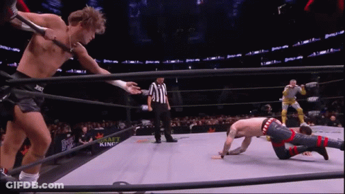 A Wrestler In A Ring With The Word Draft King On The Back Of His Shorts GIF