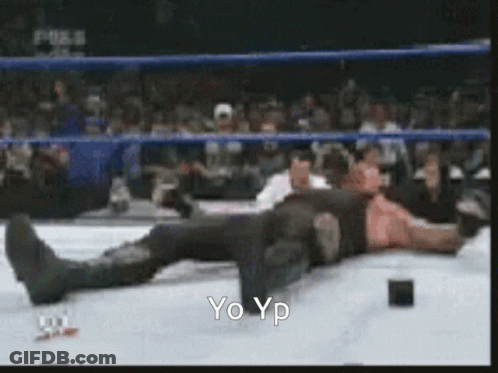 A Wrestler Is Laying On The Ground And The Words Yo Yp Are On The Bottom GIF
