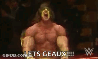 A Wrestler Is Sitting In A Ring With His Mouth Open And The Words `` Lets Geaux '' Written On The Screen . GIF