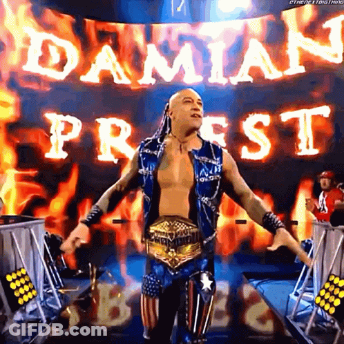 A Wrestler Is Standing In Front Of A Banner That Says Damian Priest On It GIF