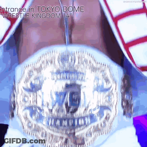 A Wrestler Is Wearing A Belt That Says Entrance In Tokyo Dome Wrestle Kingdom 14 GIF