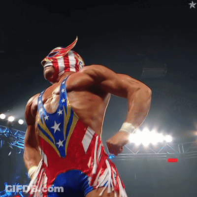 A Wrestler Is Wearing A Red White And Blue Outfit And A Mask GIF