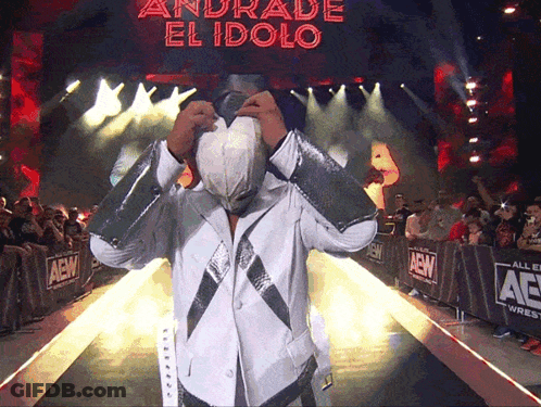 A Wrestler Named Andrade El Idolo Walks Down The Aisle GIF