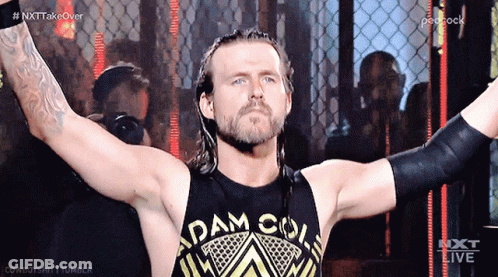 Wrestler Wearing Black Tank Top Saying Adam Cole GIF