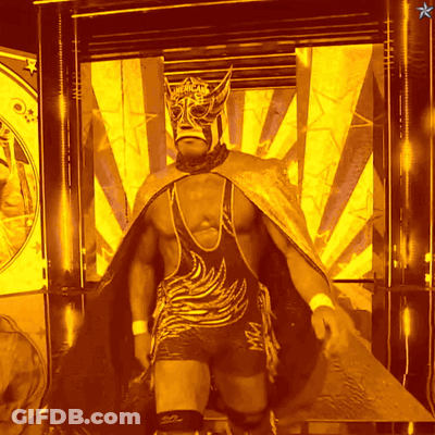 A Wrestler Wearing A Mask And A Cape That Says Mgm On It GIF