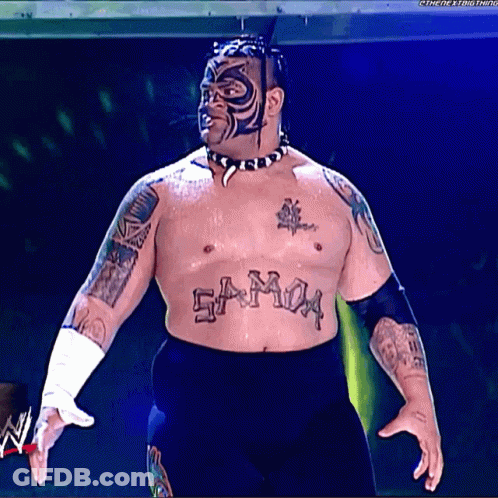 A Wrestler With A Tattoo On His Chest That Reads Samoa GIF
