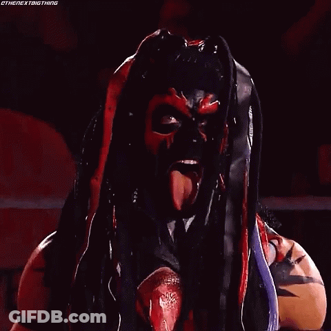 A Wrestler With His Face Painted Like A Monster With Sharp Teeth . GIF