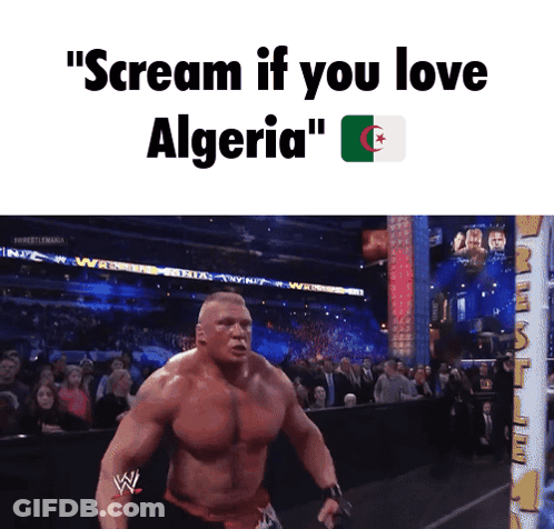A Wrestler With The Words " Scream If You Love Algeria " On Top Of Him GIF