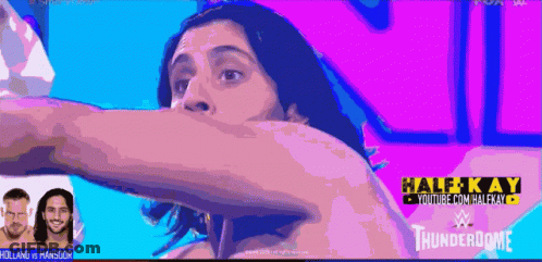 A Wrestling Match Between Holland And Mansoor Is Being Broadcasted On Youtube GIF