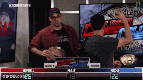 A Wrestling Match Between Murrell And Reilly Is Going On GIF