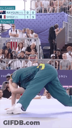 A Wrestling Match Between Raygun And Syssy Is Being Played At The Pic Games GIF