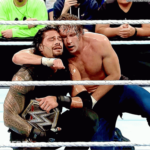 A Wrestling Match Between Roman Reigns And Dean Ambrose With The Hashtag #Thenextbigthing GIF