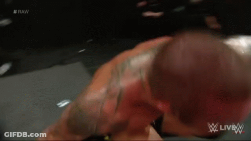 A Wrestling Match Is Being Broadcast Live On Wwe Live GIF