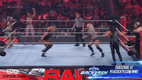 A Wrestling Match Is Being Broadcasted On Peacock Tv GIF