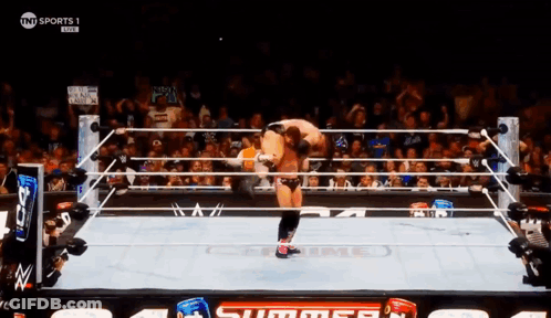 A Wrestling Match Is Being Shown On Tnt Sports GIF