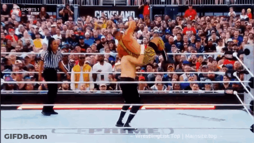 A Wrestling Match Is Being Shown On Tv With The Words Cleveland In The Corner GIF